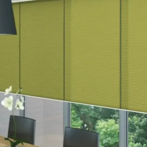 Lumi Cel honeycomb blinds in a dining room