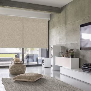 Beige roller blind on a large window in a modern living room